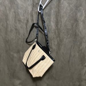 Item 121. Tan hand bag with removable shoulder strap